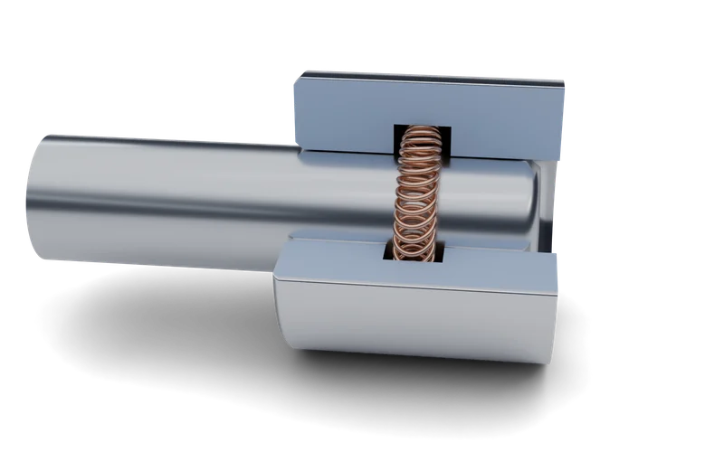 Cutaway of a housing-mounted canted spring seated in a groove in the outer housing, contacting the inserted pin