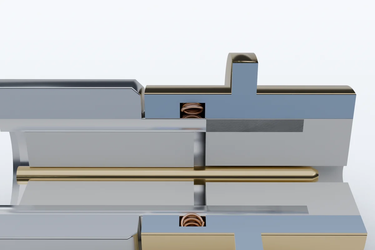 Section through a shielded coaxial connector with a canted spring providing shell-to-shell continuity