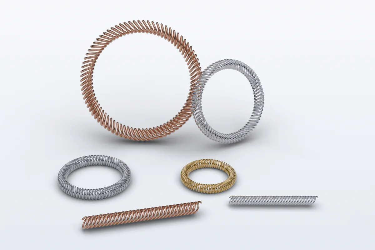 Range of canted coil spring rings and straight lengths in copper alloy, silver-plated, gold-plated and stainless finishes